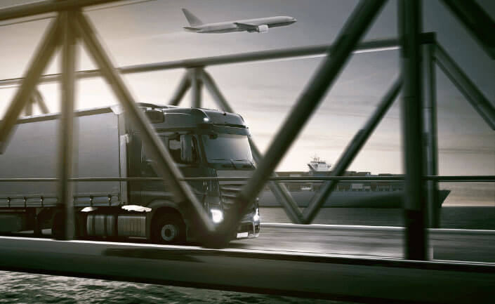 Symbolic image for logistics with aircraft, truck and container ship